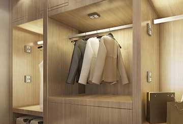 What is the wardrobe induction lamp and what is its function?