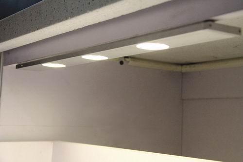 Can the built-in cabinet light be hidden?